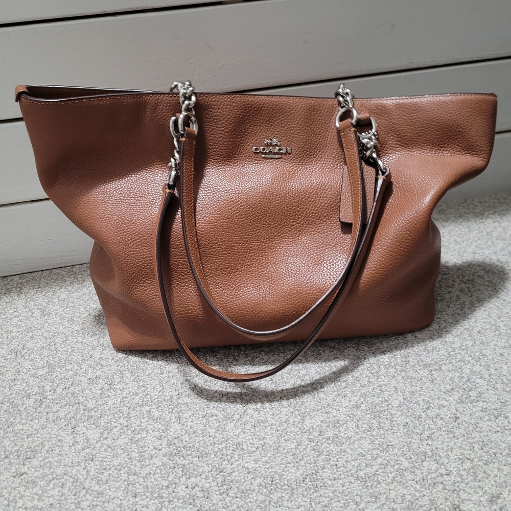 Coach Brown Leather Tote with Polished Finish and Structured Shape